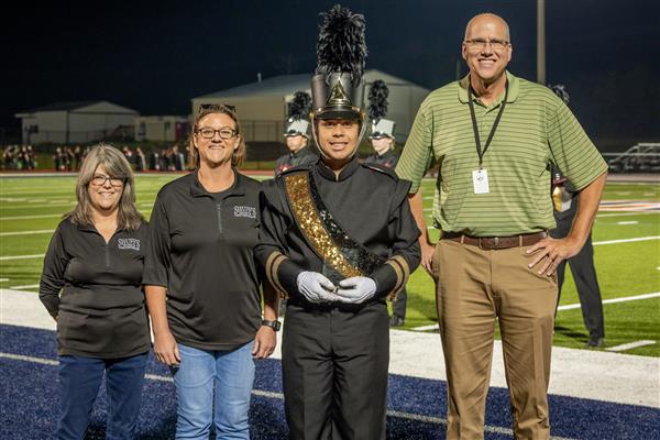 FVHS band members stand with Jason Golden